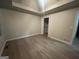 Main bedroom with a neutral palette, and a closet at 7810 Capps Ferry Rd, Douglasville, GA 30135