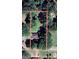 Overhead view of a property with lush trees and outlined property, and surrounding streets at 1209 Topaz Ln, Villa Rica, GA 30180