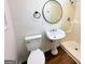Bathroom features a modern toilet, sink and tub at 1209 Topaz Ln, Villa Rica, GA 30180