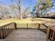 Wooden deck overlooking expansive backyard with mature trees at 1209 Topaz Ln, Villa Rica, GA 30180