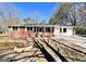 Charming one-story brick home with bright white trim and a well-manicured front lawn at 1209 Topaz Ln, Villa Rica, GA 30180