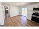 Modern kitchen with stainless steel appliances and sliding doors leading to outdoor deck at 1209 Topaz Ln, Villa Rica, GA 30180