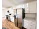 Spacious kitchen featuring stainless steel appliances, ample cabinet space, and modern finishes at 1209 Topaz Ln, Villa Rica, GA 30180