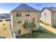 Back of the home featuring a wood deck and a partially fenced in yard at 536 Caledon Way, Hampton, GA 30228