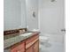 Bathroom featuring patterned wallpaper and a granite countertop at 186 Brogdon Rd, Fayetteville, GA 30214