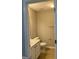 Bathroom featuring a vanity sink, toilet, and neutral color scheme at 305 Magnolia Gardens Walk, Mcdonough, GA 30253