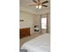 Bright bedroom featuring a dresser, mirror, and a large window at 1879 Redfern Rd, Dacula, GA 30019