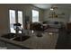 Open kitchen with granite countertops that overlooks the living room at 1879 Redfern Rd, Dacula, GA 30019