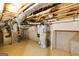 Unfinished basement featuring utilities such as a furnace and a water heater at 3786 Turnberry Ct, Duluth, GA 30096