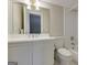 This primary bathroom offers tile flooring, a toilet, and vanity sink with storage at 3786 Turnberry Ct, Duluth, GA 30096