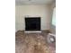 Living room featuring black fireplace and worn flooring at 2681 Oldknow Dr, Atlanta, GA 30318