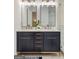 Bathroom with double vanity, modern fixtures, and walk-in shower at 4217 Paces Ferry Se Rd, Atlanta, GA 30339