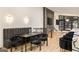 Open-concept dining area with large table, comfortable seating and modern decor at 4217 Paces Ferry Se Rd, Atlanta, GA 30339