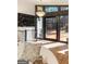 Bright foyer highlighting a chandelier, hardwood floors, and expansive windows overlooking the yard at 4217 Paces Ferry Se Rd, Atlanta, GA 30339