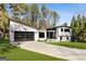 Eye-catching home with modern architecture, a well-manicured lawn, and ample driveway space at 4217 Paces Ferry Se Rd, Atlanta, GA 30339