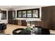 Stylish kitchen featuring dark cabinetry, stainless steel appliances, and ample counter space at 4217 Paces Ferry Se Rd, Atlanta, GA 30339