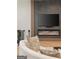Modern living room with a contemporary fireplace and mounted TV at 4217 Paces Ferry Se Rd, Atlanta, GA 30339