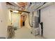 View of an unfinished basement with exposed ductwork and a utility closet, ready for customization at 240 Sandy Lake Cir, Fayetteville, GA 30214