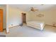 Bedroom with carpet, ceiling fan, and space for a queen size bed at 240 Sandy Lake Cir, Fayetteville, GA 30214