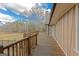 Expansive deck offering panoramic views, complemented by wood railings and access to the backyard at 240 Sandy Lake Cir, Fayetteville, GA 30214