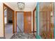 Foyer with slate floors and decorative glass door panels at 240 Sandy Lake Cir, Fayetteville, GA 30214