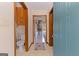 View of the front foyer with a spiral staircase and an adjacent half bathroom at 240 Sandy Lake Cir, Fayetteville, GA 30214