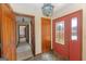 Foyer area with stone floors and a decorative glass door at 240 Sandy Lake Cir, Fayetteville, GA 30214