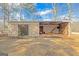 The home has a modern open shed and storage building at 240 Sandy Lake Cir, Fayetteville, GA 30214