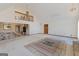 Bright living room with vaulted ceilings and spiral staircase at 240 Sandy Lake Cir, Fayetteville, GA 30214