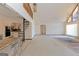 Spacious open-concept living room features a spiral staircase and vaulted ceilings at 240 Sandy Lake Cir, Fayetteville, GA 30214
