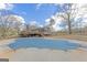 Large backyard featuring a covered swimming pool at 240 Sandy Lake Cir, Fayetteville, GA 30214