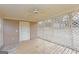 A screened-in porch with a ceiling fan, lattice, and a painted wood floor at 240 Sandy Lake Cir, Fayetteville, GA 30214