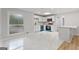 Bright kitchen featuring modern appliances, marble counters, and skylight at 2544 Overlook Dr, East Point, GA 30344