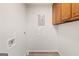 Functional laundry space with storage cabinets and essential hookups at 2544 Overlook Dr, East Point, GA 30344