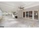 Sun room with white brick walls, tile floors, fireplace and large windows at 2544 Overlook Dr, East Point, GA 30344