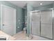 Bathroom features tiled floors, walk-in shower, toilet, and vanity with sink at 509 Carleton Pl, Locust Grove, GA 30248