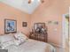 Elegant bedroom with a vaulted ceiling, neutral carpet, and a lovely decorative bedroom set at 509 Carleton Pl, Locust Grove, GA 30248