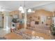 Open concept dining area connected to the kitchen and living room, featuring natural light at 509 Carleton Pl, Locust Grove, GA 30248