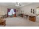 Expansive bedroom with tray ceiling, natural lighting, and plenty of open floor space at 509 Carleton Pl, Locust Grove, GA 30248