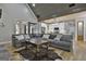 Open-concept living room with hardwood flooring flowing into the kitchen at 285 Hogan Coweta Rd, Hogansville, GA 30230