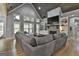 Living room featuring vaulted ceilings, stone fireplace and large windows for ample natural light at 285 Hogan Coweta Rd, Hogansville, GA 30230