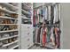 A walk-in closet with built-in shelves and hanging rods provides ample storage space at 285 Hogan Coweta Rd, Hogansville, GA 30230