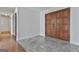 Spacious entryway with tiled floor, hardwood floors and view of additional rooms at 205 Castlewood Rd, Tyrone, GA 30290