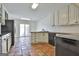 Kitchen with granite countertops and stainless steel appliances at 205 Castlewood Rd, Tyrone, GA 30290