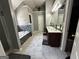 Bathroom with double vanity, decorative tile, and garden tub for a luxurious bathing experience at 4683 Derby Loop, Fairburn, GA 30213