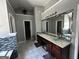 Bathroom featuring a double vanity, garden tub, and tiled floors at 4683 Derby Loop, Fairburn, GA 30213