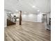 Finished basement with kitchen, recessed lighting, and staircase at 102 Pinegate Rd, Peachtree City, GA 30269