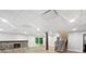 Finished basement with recessed lighting, fireplace, and a staircase at 102 Pinegate Rd, Peachtree City, GA 30269