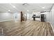 Finished basement with kitchen, recessed lighting, and staircase at 102 Pinegate Rd, Peachtree City, GA 30269