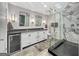 Luxurious bathroom with double vanity, modern fixtures, and a sleek glass-enclosed shower at 102 Pinegate Rd, Peachtree City, GA 30269